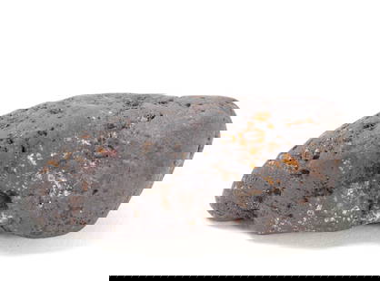 Wonderful Ancient Meteorite Specimen, 39 Grams: Ancient meteorite mineral specimen with lovely earthen deposits throughout. Well worn surface smooth with pitting throughout. Wonderful silvered sheen to the surface throughout. Size 1 5.8" L, Weight