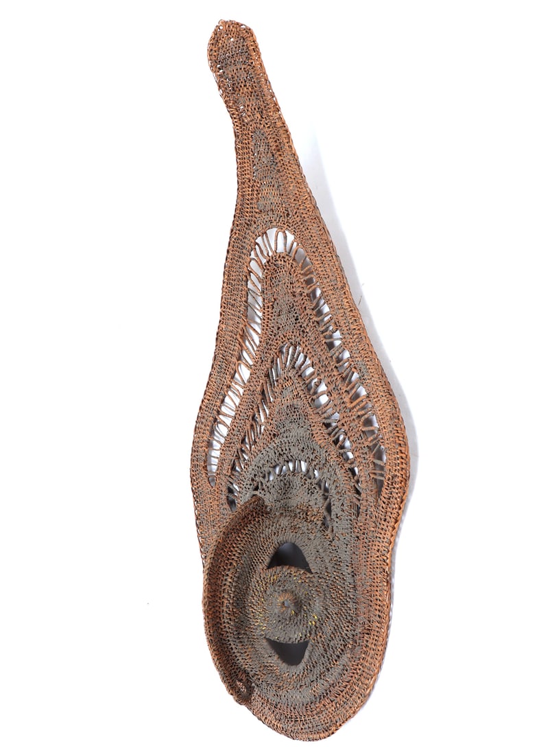 Tall PNG Avian Style Yam Mask: Late 19th to early 20th century. Abelam people, Papua New Guinea. Tall hand woven and shaped wood and fiber Yam mask. Wonderfully accented and detailed with a light orange pigment throughout, with an 