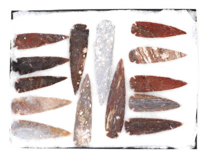Fantastic Group of 14 Spear & Arrowheads: Wonderful collection of Native American hand made spear heads and arrowheads in various stone compositions including wonderful red jasper examples. Size of largest 7" L, please note additional shippin