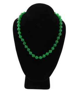 Beautiful Chinese Jade Style Necklace: Gorgeous spinach green Chinese jade style beaded necklace with dozens of beautiful beads strung on a matching silk green thread. Size 17" L, bead 3/8" W