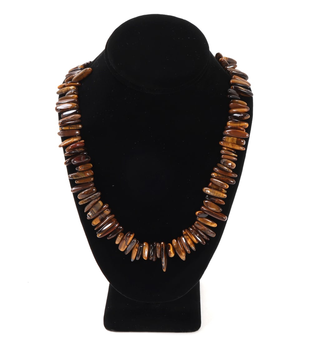 Stunning All Natural Tiger's Eye Chip Seed Necklace: Beautiful all natural chip seed beaded necklace with dozens and dozens of beautiful beads throughout. Each one beautifully unique and brilliant striped. Gold, caramel, mocha and dark wine red coloring