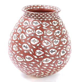Handsome Hand Crafted Vase of 100 Fishes: Beautiful hand crafted ceramic vase in a lovely adobe color underglaze. Fish in a rainbow of colors throughout including reds, oranges, browns and other earthen tones throughout. Large bulbous body fo