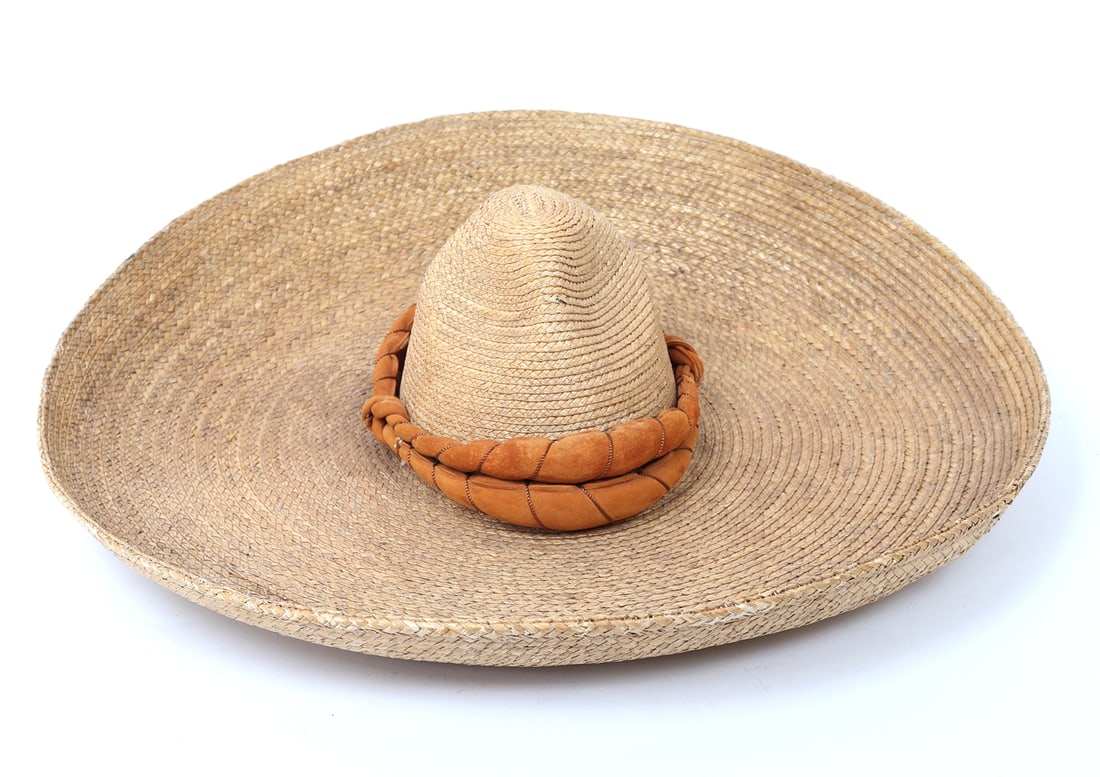 Vintage Mexican Sombrero: Vintage Mexican Palm Leaf Sombrero. Soft orange decorative band wrapped in light brown fabric. 23" W brim to brim