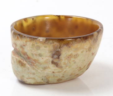 Lovely Coral Carved Fossilized Bowl: Beautiful coral carved bowl in creams oranges and reds throughout. Deep smoothed bowl with sturdy flat base. Size 3 1/2" L x 3" W x 2" H, weight 204g