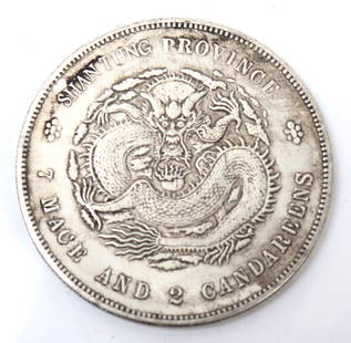 Chinese Silver Style Coin, Five Claw Dragon: Chinese silver style coin featuring a five claw dragon to the face hovering above a flaming pearl, with calligraphy and seal marks to the reverse. Size 1 1/2" L x 1 1/2" W, weight 22g
