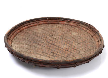 Filipino Ilocano Basket Tray: Lovely hand woven rattan Ilocano basket tray made of split rattan in an intricate tight weave in a one over two twill pattern. Skin of the rattan remains on the inside to provide a smooth even surface