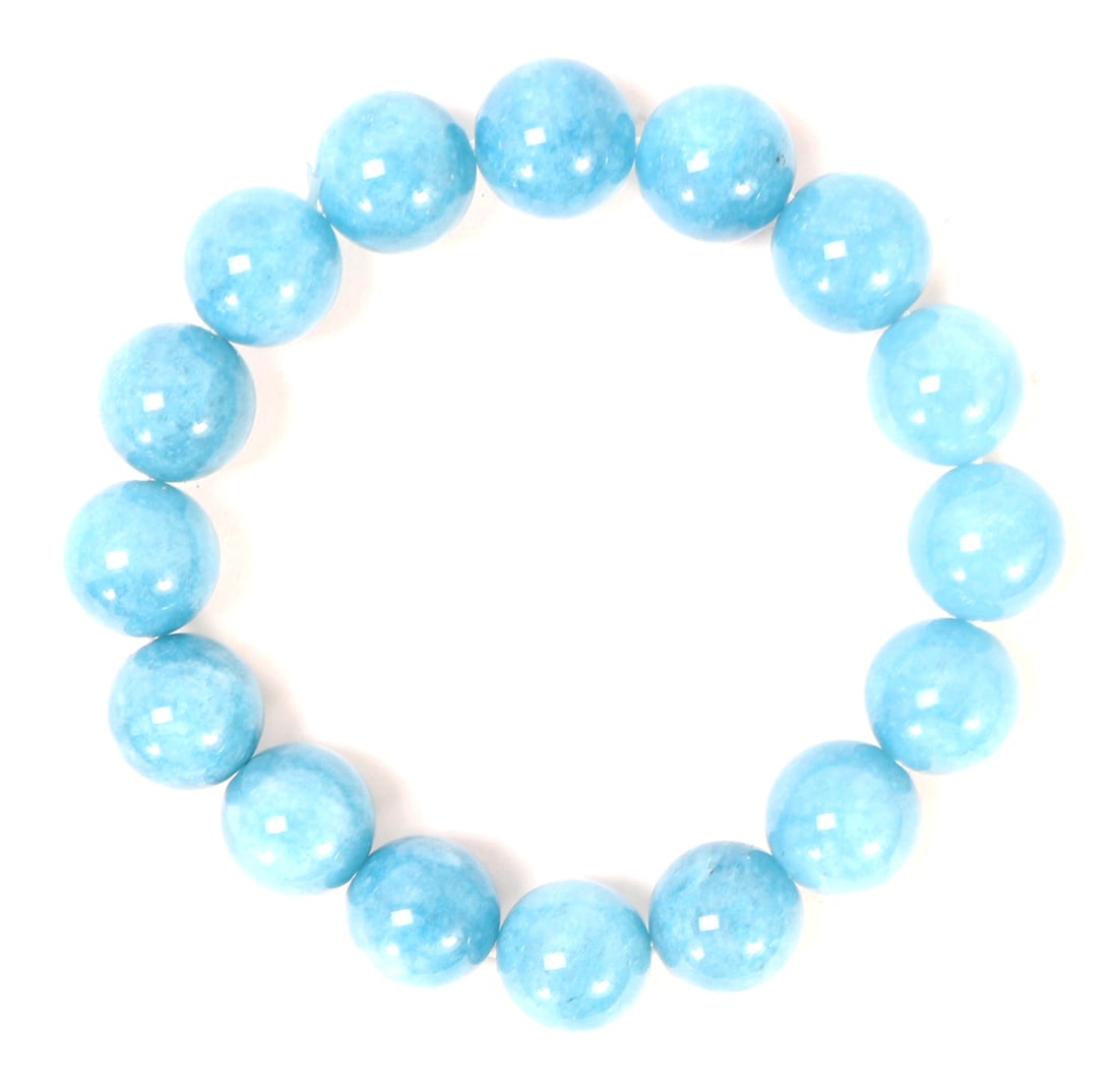 Beautiful Aquamarine Beaded Bracelet: Gorgeous aquamarine beads strung in a lovely bracelet. Each bead with a lovely cloud like marbling throughout. Size 2 3/8" W