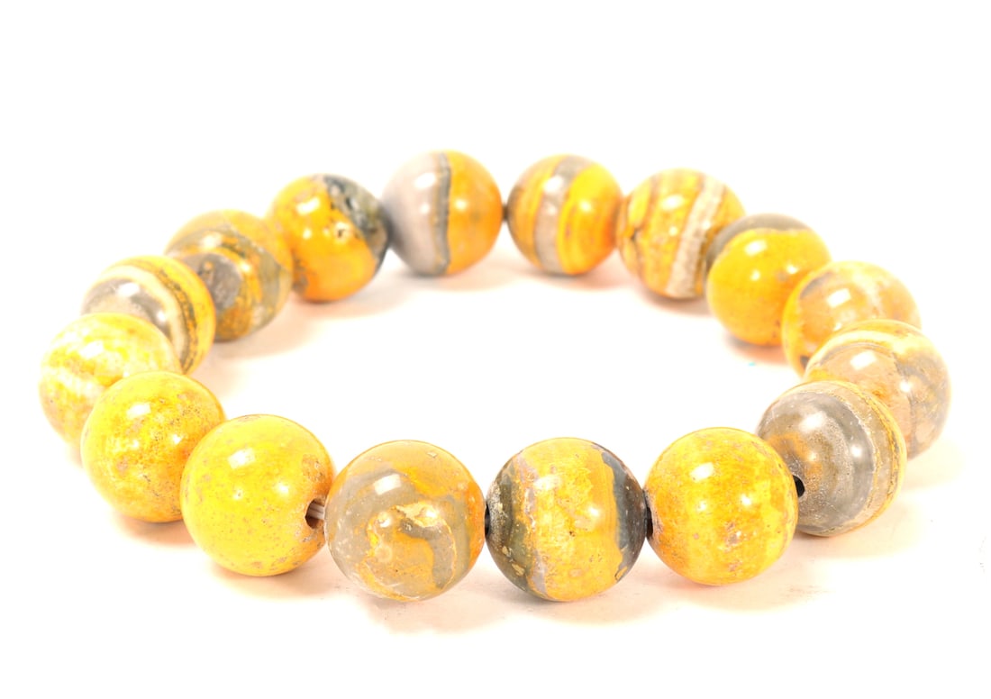 Gorgeous Bright Yellow Bumblebee Jasper Beaded Bracelet: Lovely bright yellow bumble bee jasper beaded bracelet with grey and black striping throughout eat unique bead. Size 2 1/8" W