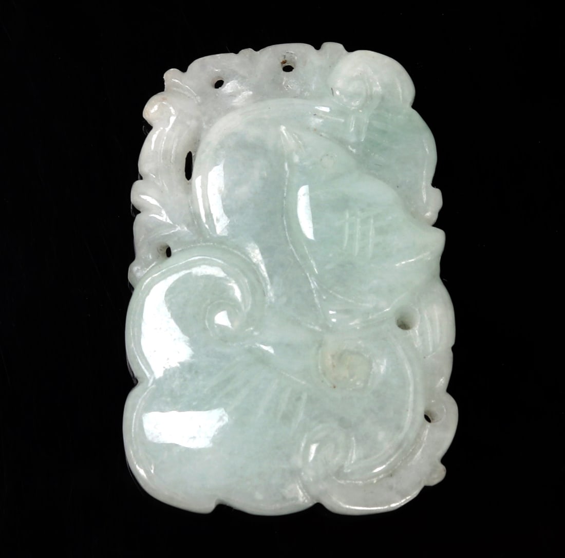 Chinese Fruit Bat Carved Pendant: Fine Chinese jade style pendant depicting fruit bats on each side with foliage in the background. Pierced to the top for suspension. Size 1 1/2" L, Weight 16 grams