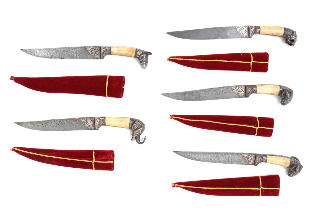 5 Damascus Knives & Sheath: Wonderful set and collection of 5 Damascus steel knives including an elephant, horse, tiger and a pair of rams. Each of the knives in prominent silver inlay over a Damascus steel pattern to the blade.