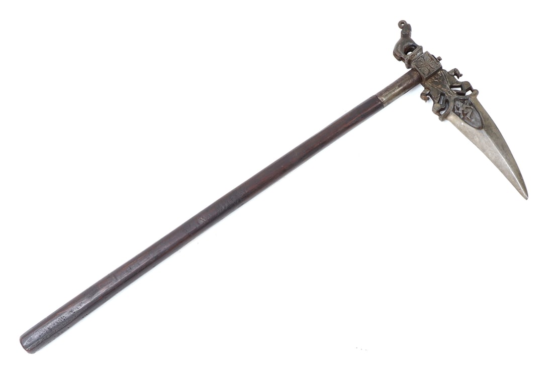 Indian Zaghnal Axe: Indian zaghnal axe with a nicely formed head featuring an elephant in full relief to one side as a hammer and the forward blade a double edge diamond cross-section and pierced openwork. Size 22" L, we