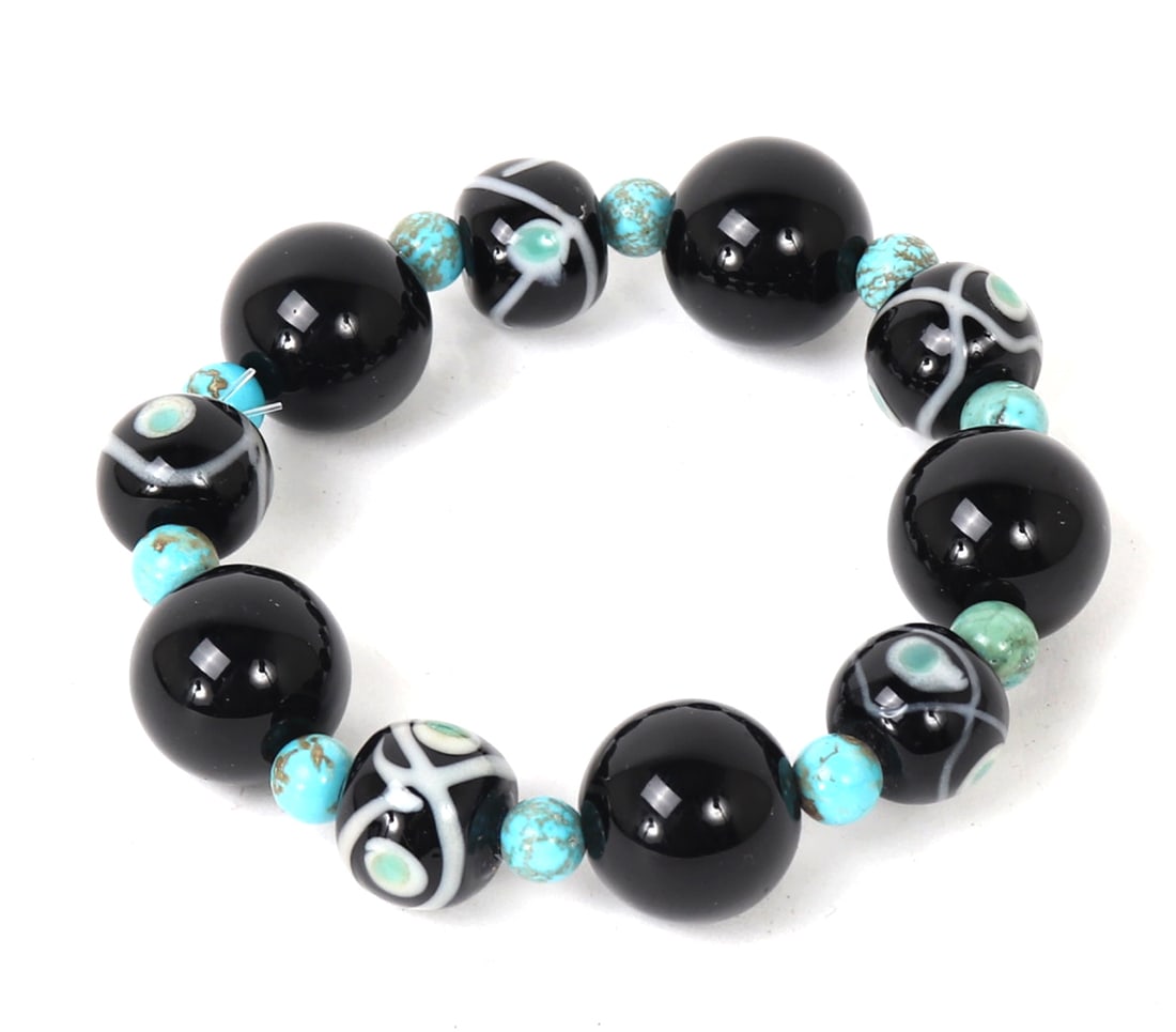 Beautiful Millefiori Glass & Turquoise Bead Bracelet: Beautiful interchanging beads of millefiori glass and turquoise. Each brightly accenting each other with beautiful turquoise throughout. Size 3" L x 3" W x 1/4" H