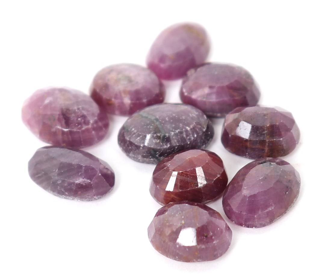 Gorgeous Oval Cut Raw Ruby Specimens: Ten beautiful oval cut raw rubies in various deep ruby, red and purple coloring throughout. Ready to be set into rings, bracelet or earrings. 13 grams total