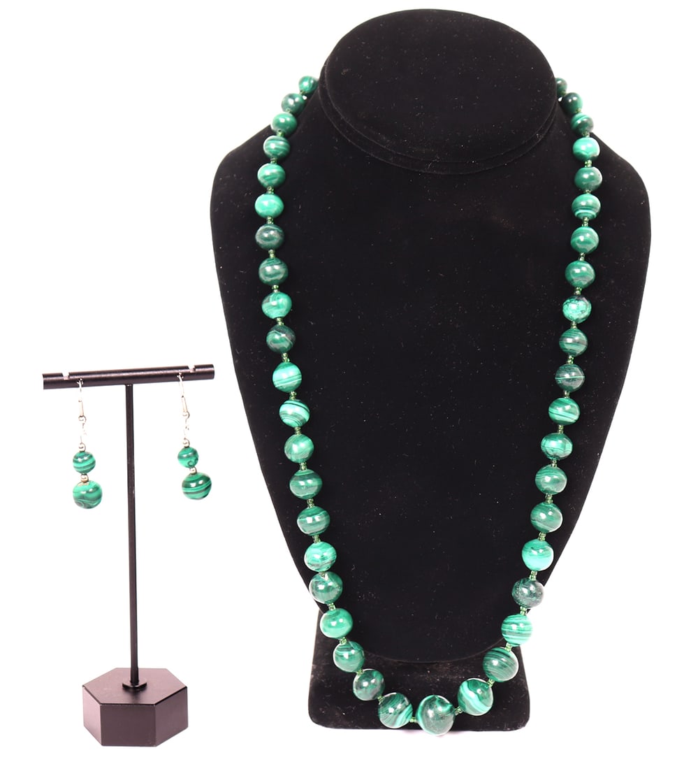 Vintage Malachite Necklace and Earrings: Lovely matched set of malachite beaded necklace and earrings. Each heavily marbled with bright white bands blending to deep dark green. A wonderful addition to any ladies collection. Size 24" L (neckl