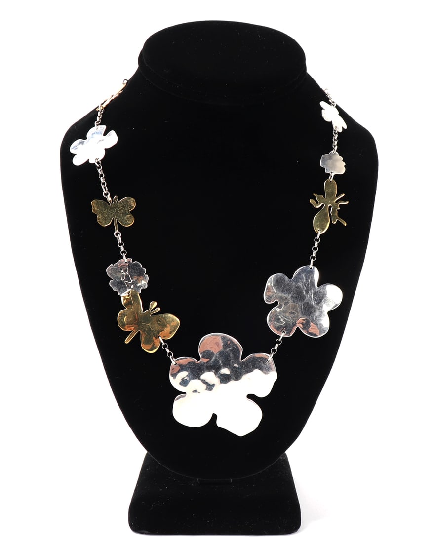 Beautiful Robert Lee Morris & Andy Warhol Sterling Brass Flower Butterfly Necklace: Eleven beautiful unique floral, butterfly and dragonfly pendants strung together comprising a gorgeous necklace from the Andy Warhol Foundation. Marked sterling silver 925. Size 20 3/4" L , 42 grams,
