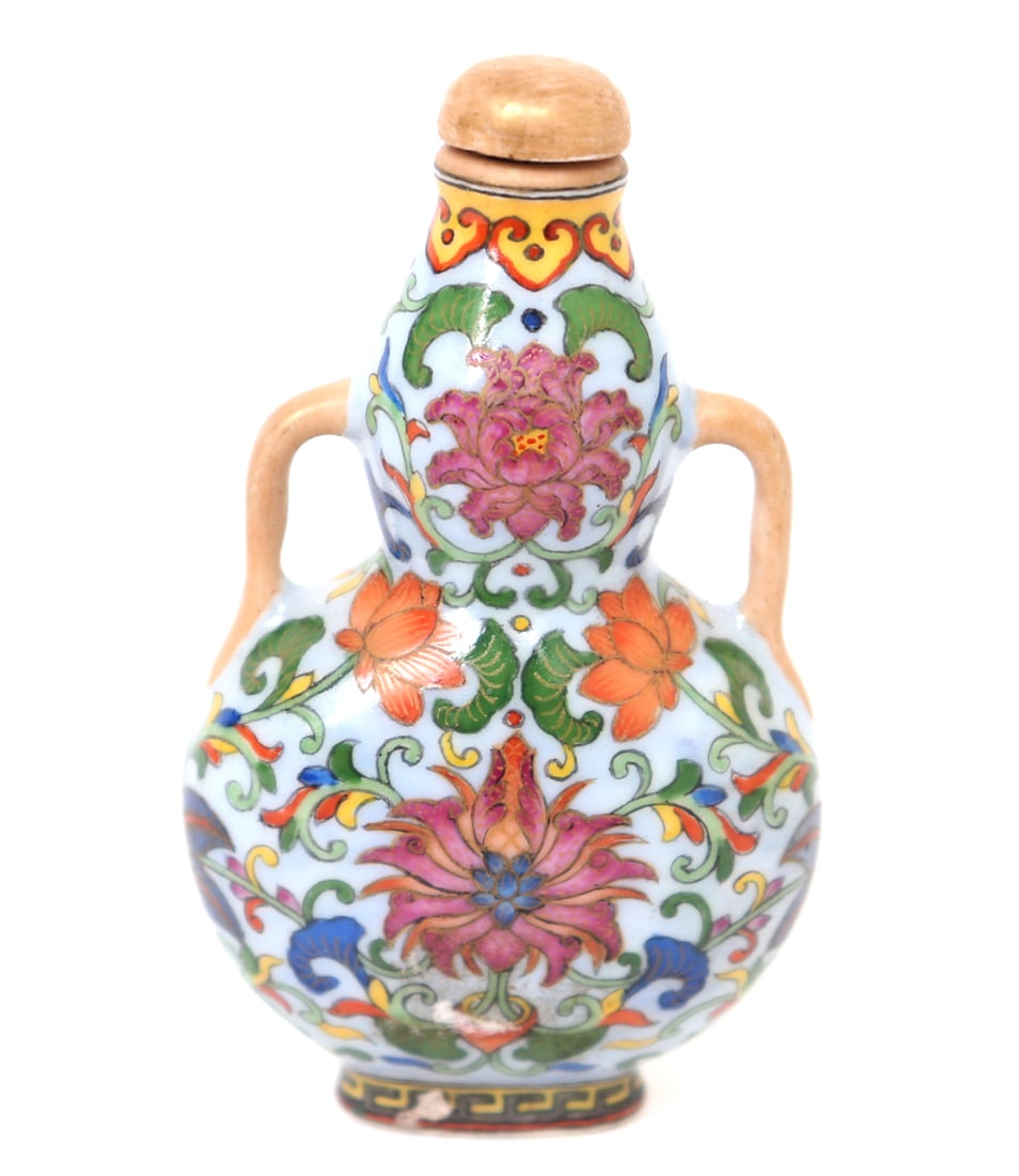 Lovely Chinese Floral Porcelain Snuff Bottle: Nice Chinese porcelain snuff bottle. Painted all over with blooming flowers and foliage throughout, amphora shaped with gold yellow painted handles. Mark to base. Size 3 1/4" H