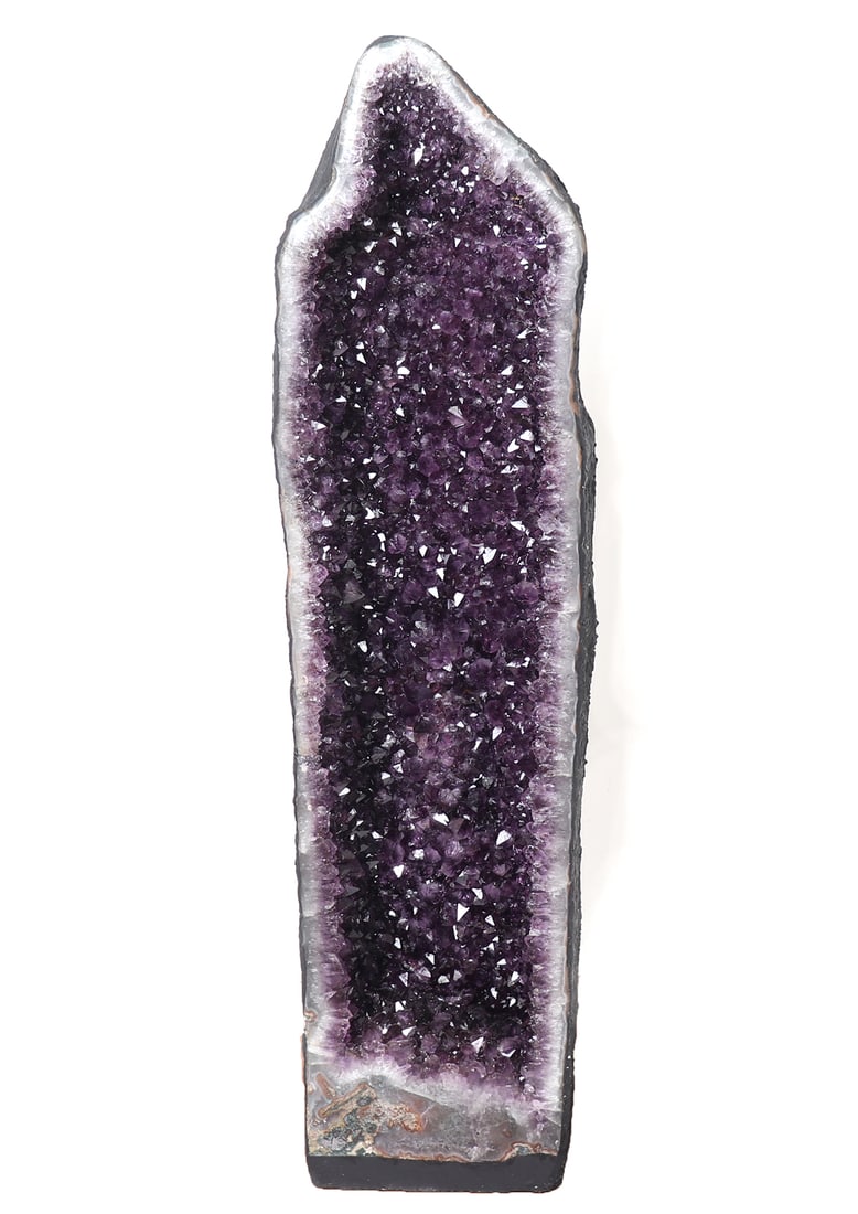 Stunning Dark Purple Amethyst Cathedral Geode: Measuring four feet tall, this marvelous amethyst cathedral geode is one of a kind. Hundreds of deep dark purple terminals throughout, midnight sky purple framing with pure white cloud whispers to the