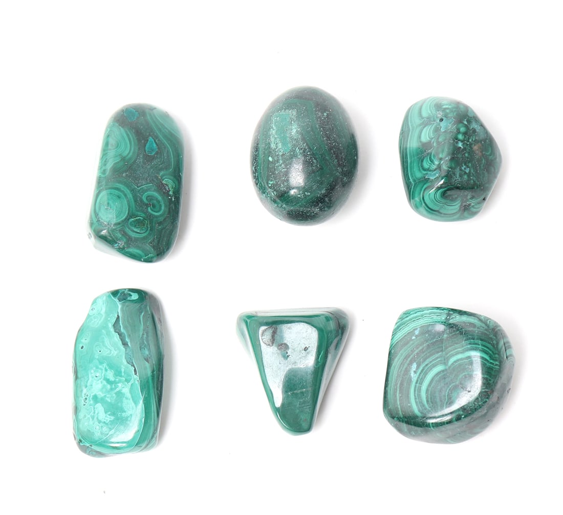 Group of Six Polished Malachite Specimens: Lovely group of six polished malachite pieces varying in size. Could be fashioned as pendants as well as used as desk paper weights. Size of largest 1 3/4" L