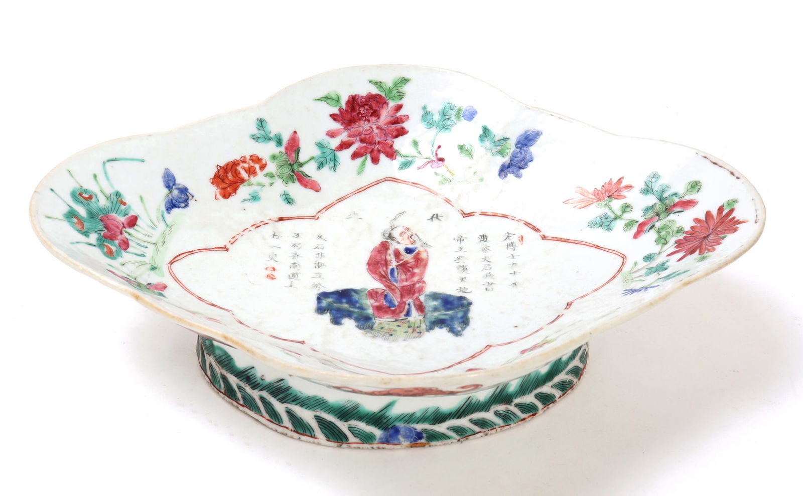 Antique Chinese Famille Rose Porcelain Footed Dish: Finely decorated Chinese Famille Rose footed porcelain dish, likely dating to the late 19th century Qing Dynasty. The dish features a charming quatrefoil form, raised on a conforming spreading foot ad