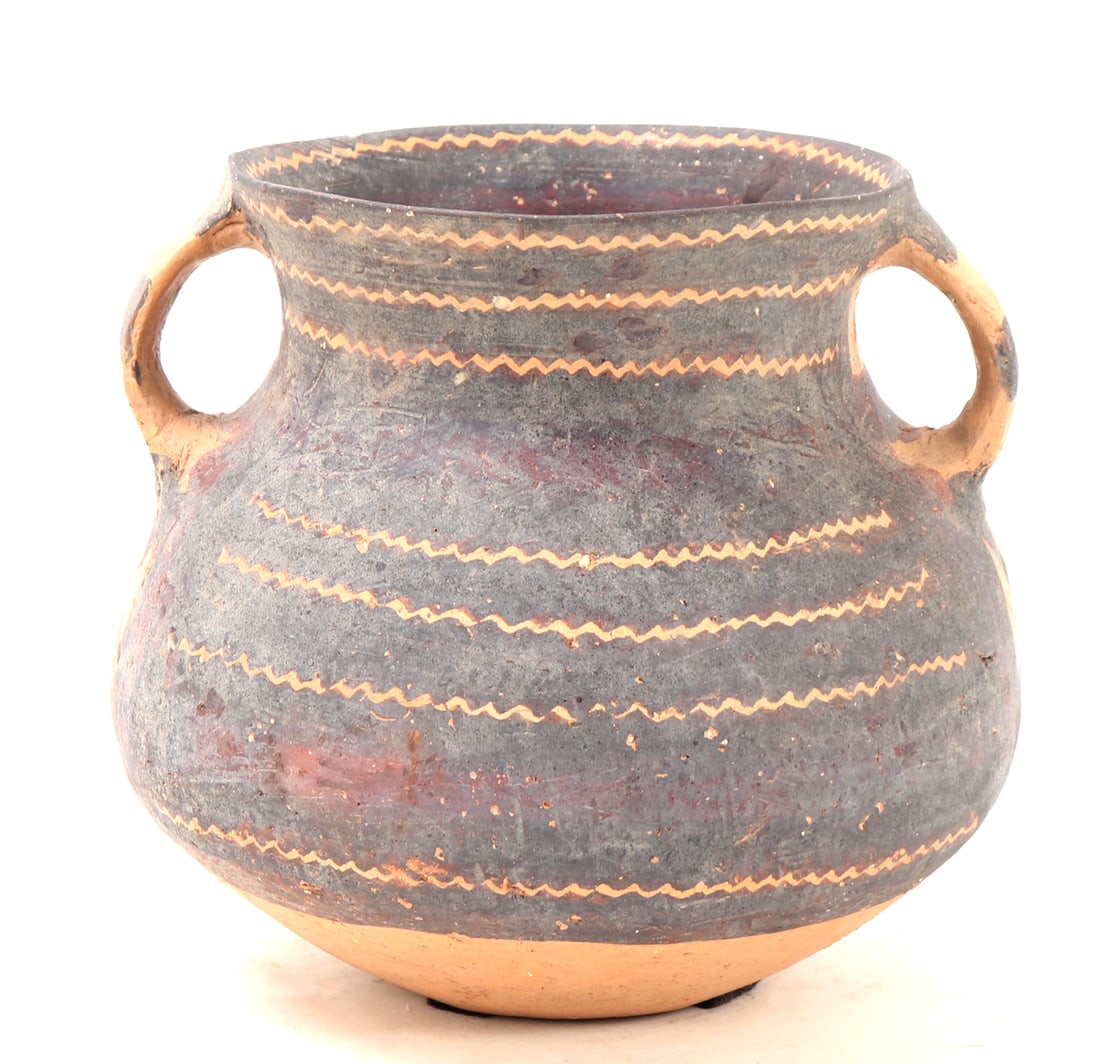 Beautiful Chinese Neolithic Pottery Bowl: Lovely early Chinese Neolithic ceramic pottery bowl with arched smooth handles. Painted throughout the bulbous body with ridged wave designs in repeating lines throughout. Bowl with flat base, a rotun