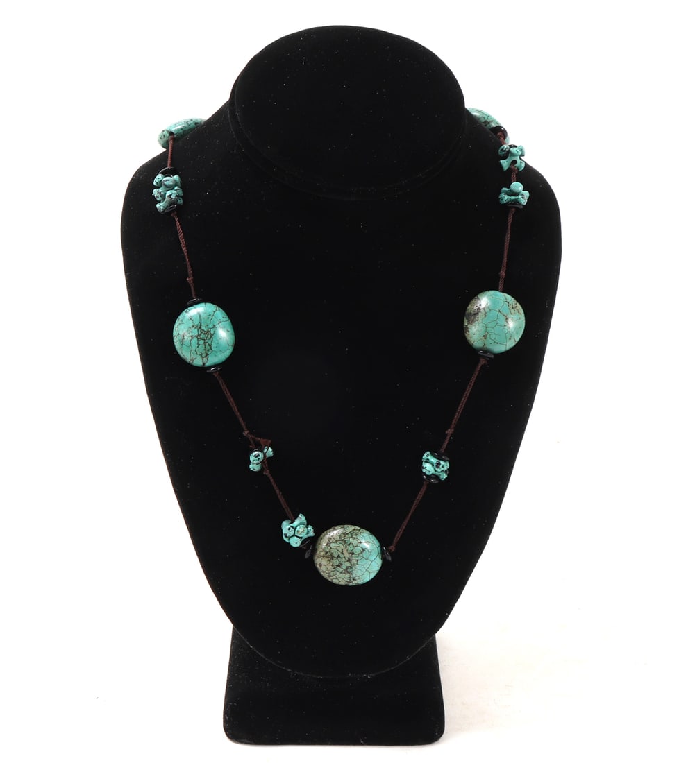 Lovely Natural Turquoise Beaded Necklace: Beautiful all natural raw turquoise beads mounted on thread. Moon shaped beads with accenting bone joint shaped beads throughout. Size necklace 37" L, bead 1" L