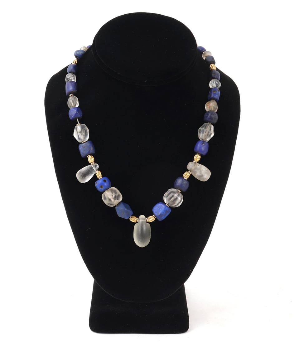 Roman Quartz, Glass, Lapis & Gold Bead Necklace: Hefty Roman bead necklace comprised of period quartz, glass, Lapis Lazuli, and gold beads. Circa 200 BCE - 300 CE. Many impressive and very large beads including three big tear drop quartz stones surr