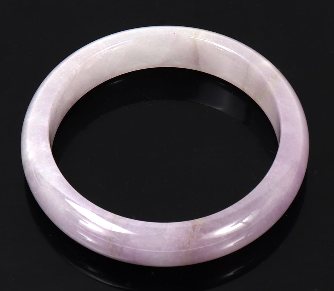 Beautiful Natural Amethyst Bangle Bracelet: Natural polished amethyst made into a perfectly wearable bangle bracelet. Lovely coloring throughout ranging from deep to light purple coloring throughout. Size 3" W, Weight 58g