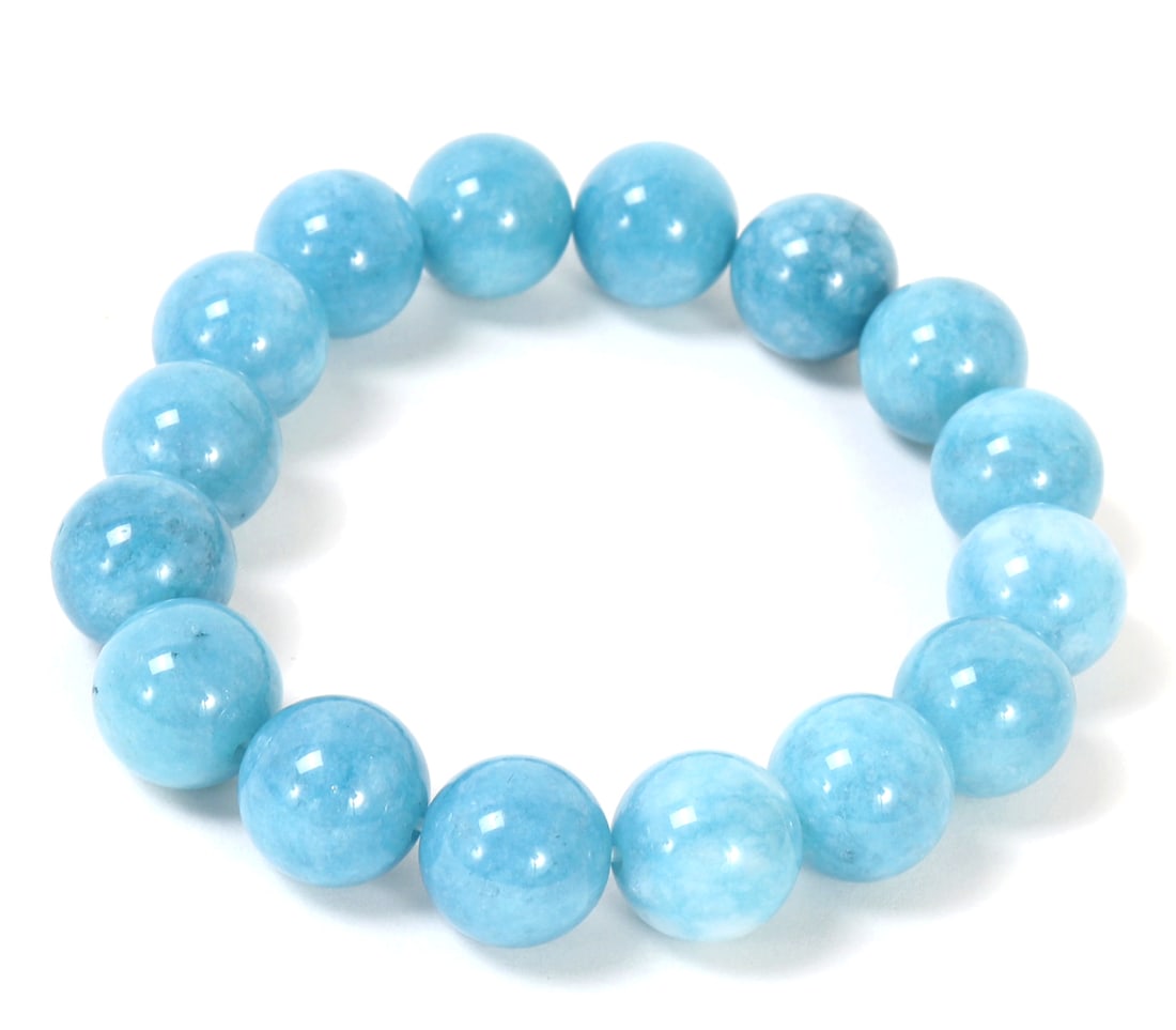 Lovely Aquamarine Beaded Bracelet: Gorgeous aquamarine beads strung in a lovely bracelet. Each bead with a lovely cloud like marbling throughout. Size 2 7/8" OD, 2" ID, Weight 40 g