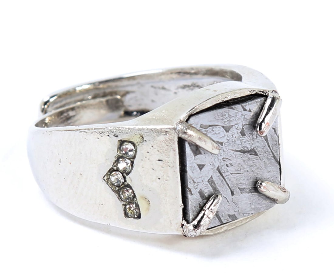 Nice Raw Meteorite Slab Ring: Raw natural ancient meteor mineral slab in a square bezel with diamond simulants in a spread wing shape. Band is fully adjustable. Size US 9 1/2, Slab 1/2" W, Box 2 1/4" L x 2 1/2" W x 1 7/8" H