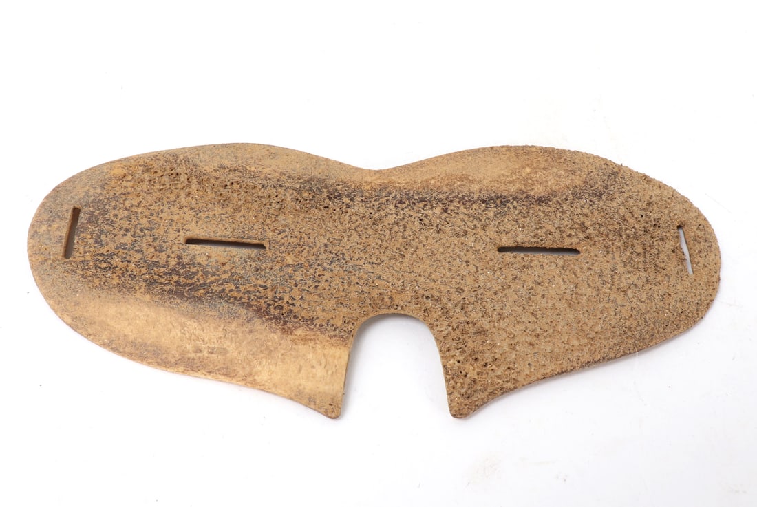 Inuit Bone Snow Goggles, 20th Century: Native American, Pacific Northwest, Alaska, Inuit Eskimos, ca. early 20th century CE. Carved from a piece of Caribou horn with two narrow slits to only allow a small amount of light to filter through.