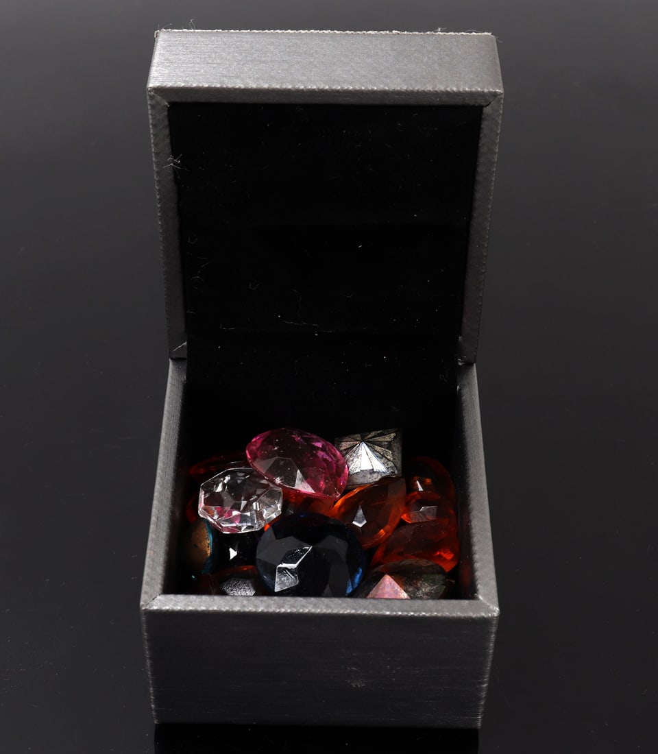 Wonderful Collection of Polished Crystals: Beautiful collection of mixed colored polished crystals ready to be set for rings, bracelets or necklaces. Bright orange, pink, blues and more with various shapes and sizes throughout. Size box 2 5/8"