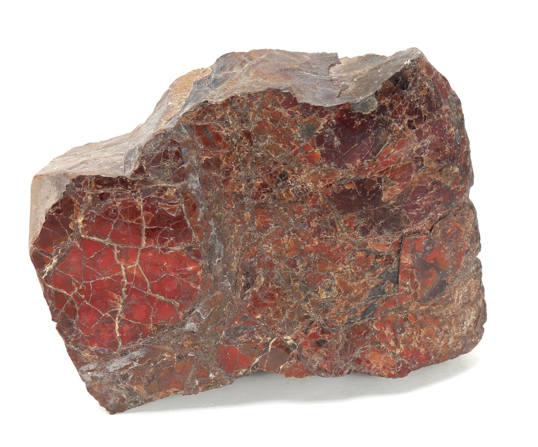 Large Heavy Raw Red Desert Jasper Specimen: Beautiful raw section of red desert jasper mineral specimen, weighing over eight pounds in total. Bright red coloring throughout with mixed matrix remaining. Size 7 1/2" L, weight 8 lb. 10 oz