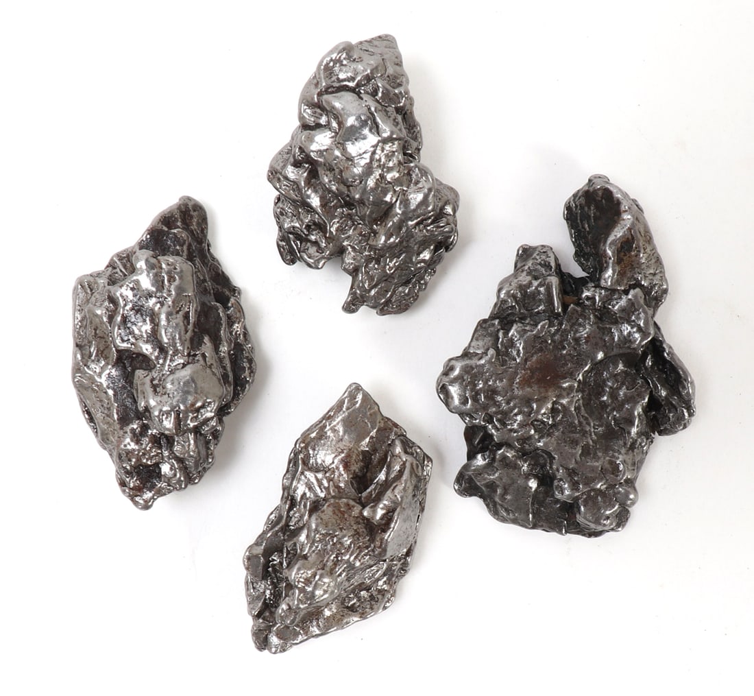 Four Wonderful Ancient Meteorites, Campo de Cielo: Fine group lot of four wonderful ancient raw meteorites. All in wonderful free form throughout, Size of each 1 7/8" L