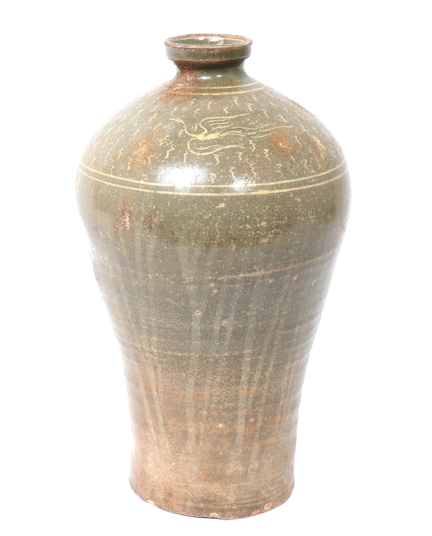 Lovely Antique Korean Celadon Glazed Vase: Antique Korean green celadon glazed vase hand thrown into a lovely shape with a narrow body and wide shoulders. Shoulders are dual banded in a cream white with birds in flight among rain or cloud whis