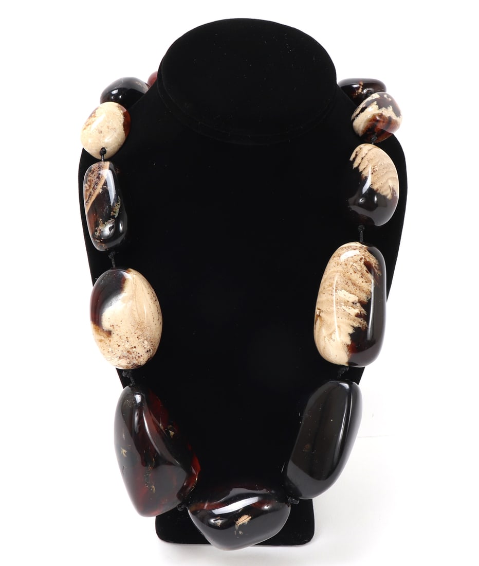 Natural Dark Blue Amber Chunky Necklace: Gorgeous mushroom inclusion blue amber chunky necklace. Thirteen polished smooth chunky blue amber beads on a cord with an adjustable strap necklace. Size 26" L , 215 grams