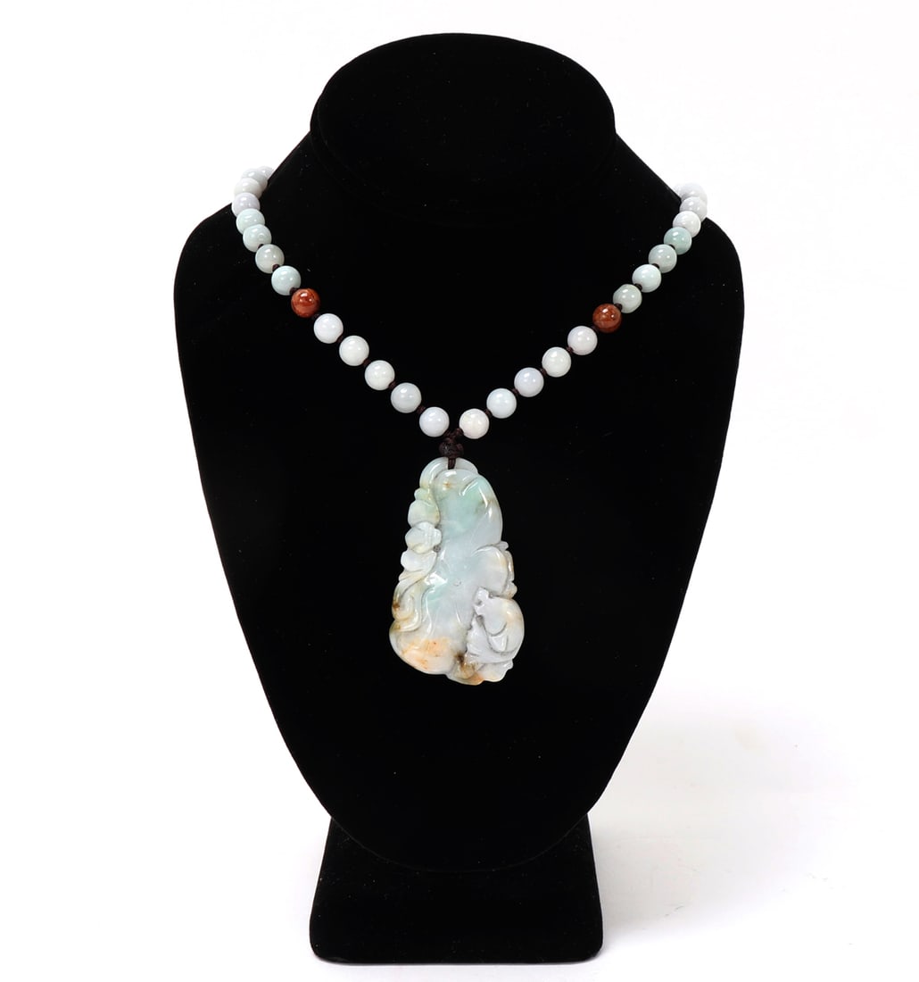 Gorgeous Chinese Jade Necklace, Gourd Pendant: Lovely Chinese jade carved guard pendant surrounded by white jade accent beads with two red jasper style beads for added color. The main pendant is expertly carved and detailed throughout with a