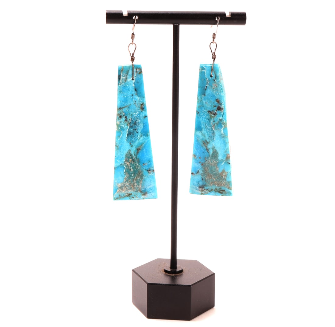 Lovely Natural Turquoise Slab Earrings: Beautiful turquoise slab drop earrings with bright blue and green coloring throughout with natural root marks throughout. Size 2 1/2" H x 7/8" W