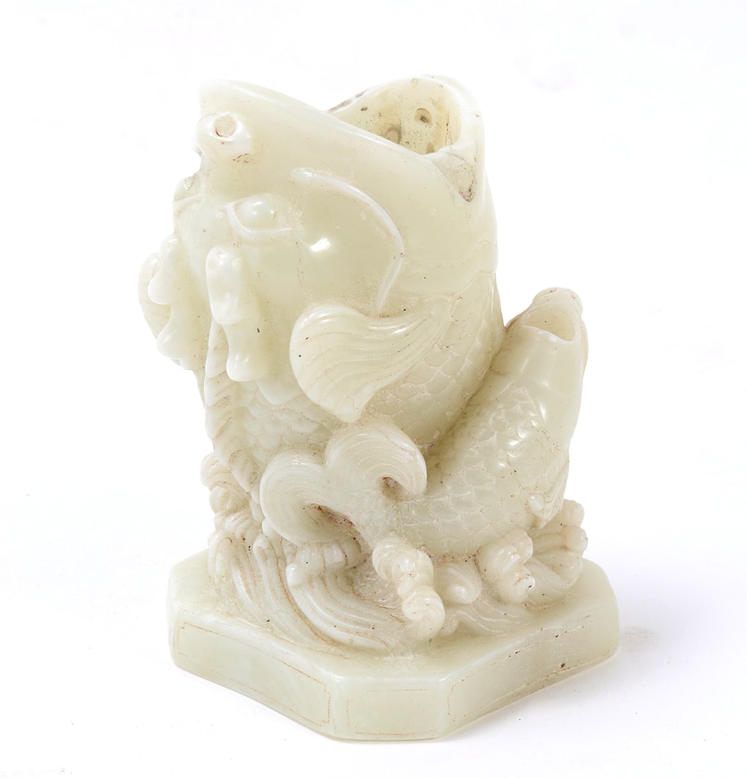 Chinese Boxwood Fish Brush Holder: Fine Chinese hardstone carving of boxwood fish with fry, mouth agape to be used as a brush holder. Intricate details throughout including a boxwood fry, ocean waves throughout. Size 5 1/4" H, weight