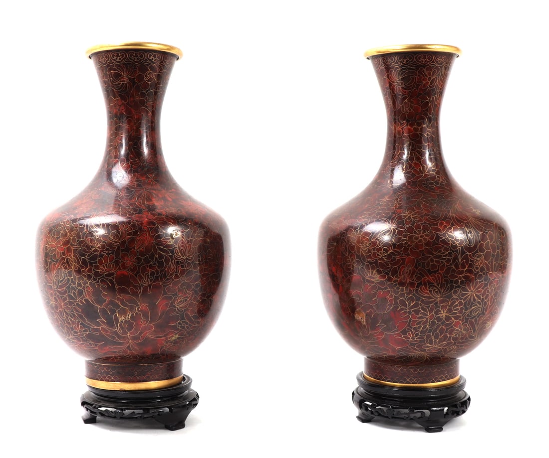 Gorgeous Pair of Red Chinese Cloisonne Vases: Chinese red cloisonne vases with beautiful intricate copper inlay throughout with blooming chrysanthemum flowers covering the body. Narrow taper long neck with slightly flared rim. Base is unmarked