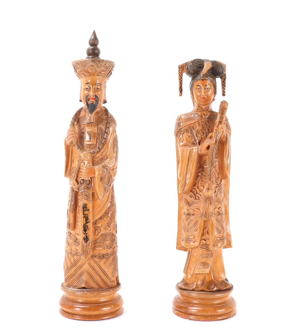 Emperor Qianlong & Empress Lady Wei Carved Figures: Chinese carved or cast figures of Emperor Qianlong and Empress Lady Wei. Empress Lady Wei who later became Empress Xiaoyichun, was one of Emperor Qianlong favorite concubines. They are both depicted