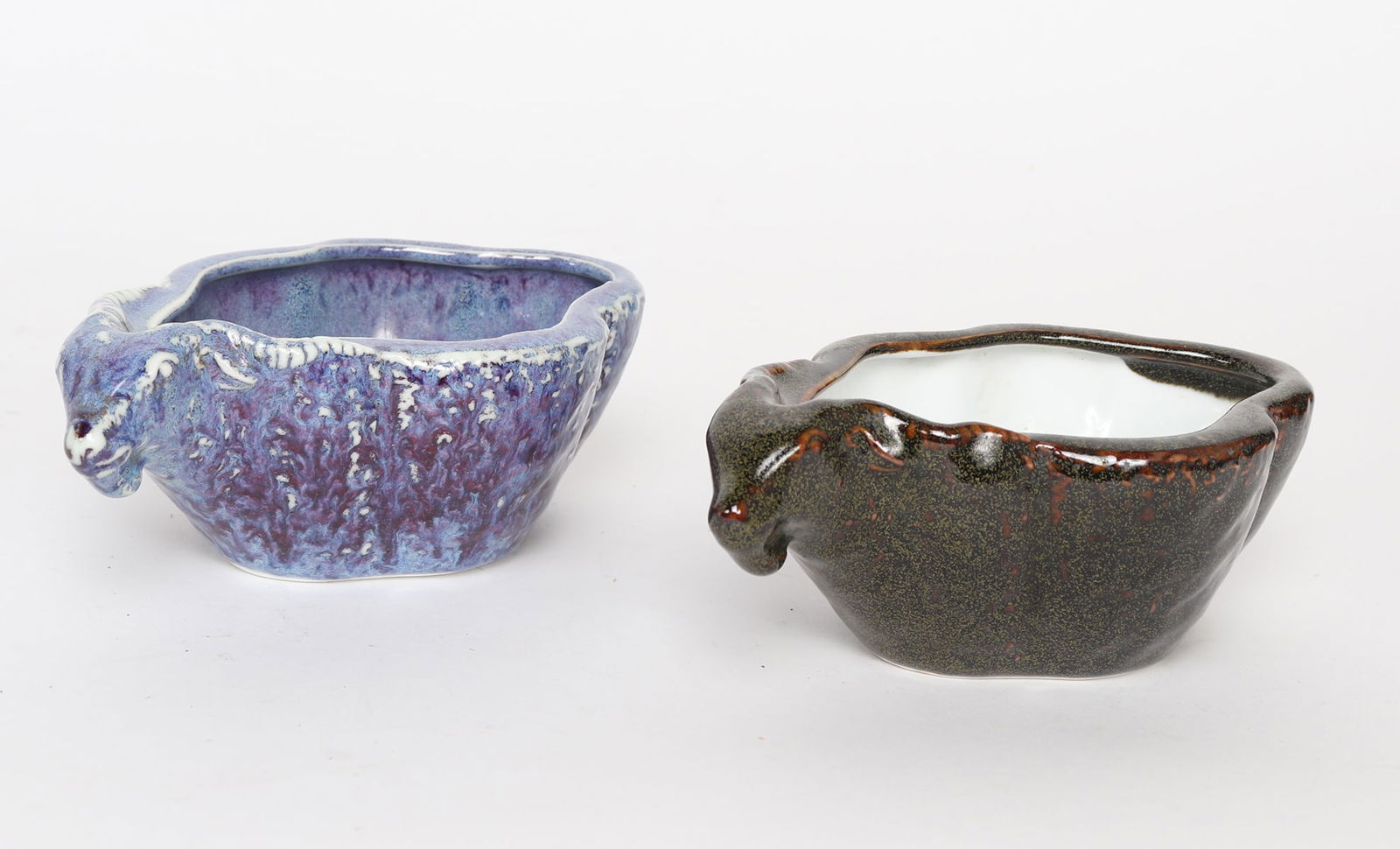 Decorative Ceramic Vessels: Decorative ceramic vessels in animal form, one blue and purple, the other brown colored. Size 6 3/4" L