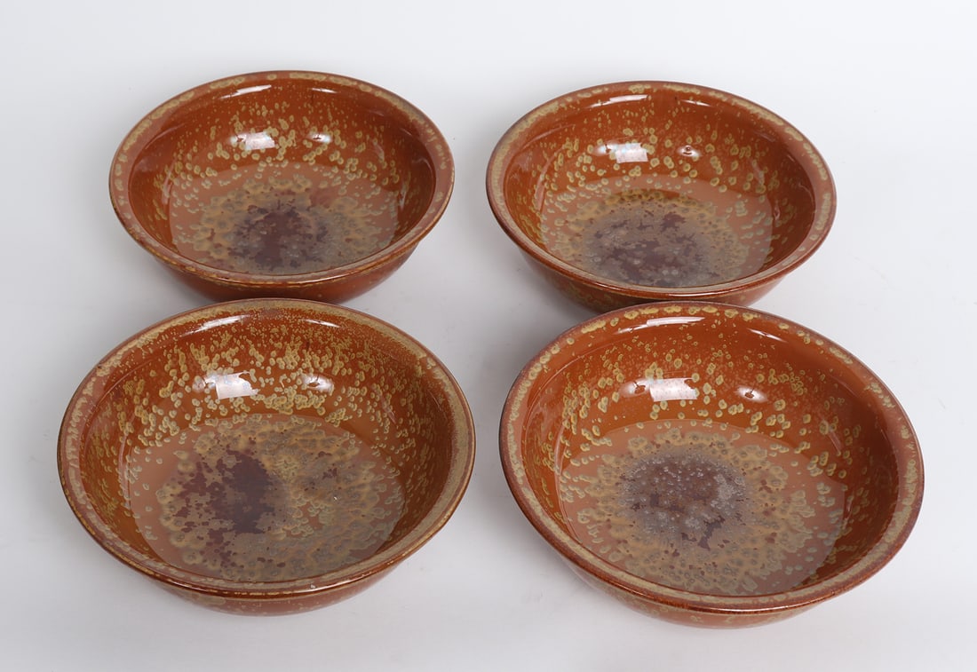 Four Decorative Brown Speckled Bowls: Four decorative brown speckled bowls. Size 8 1/2" W