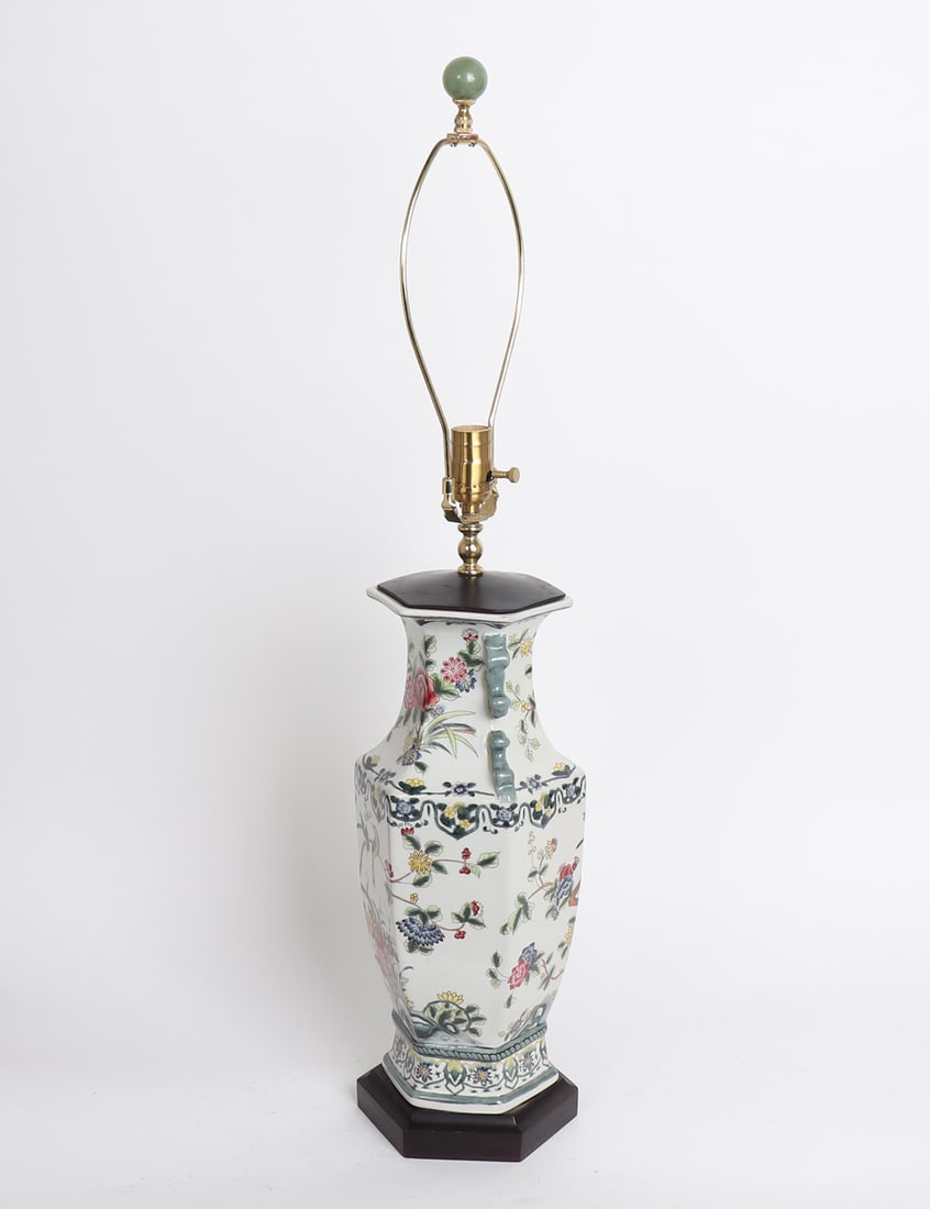 Chinese Porcelain Vase Lamp: Chinese porcelain vase converted into working lamp with floral designs on white background, hardstone finial to top. Size 34" H