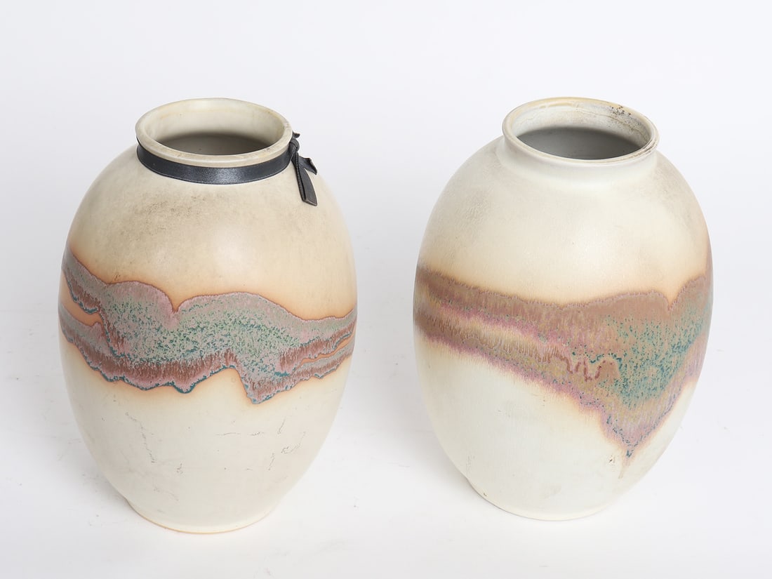 Pair of Decorative Ceramic Vases: Pair of decorative ceramic vases with central colorful band. Size largest 9 1/4" H