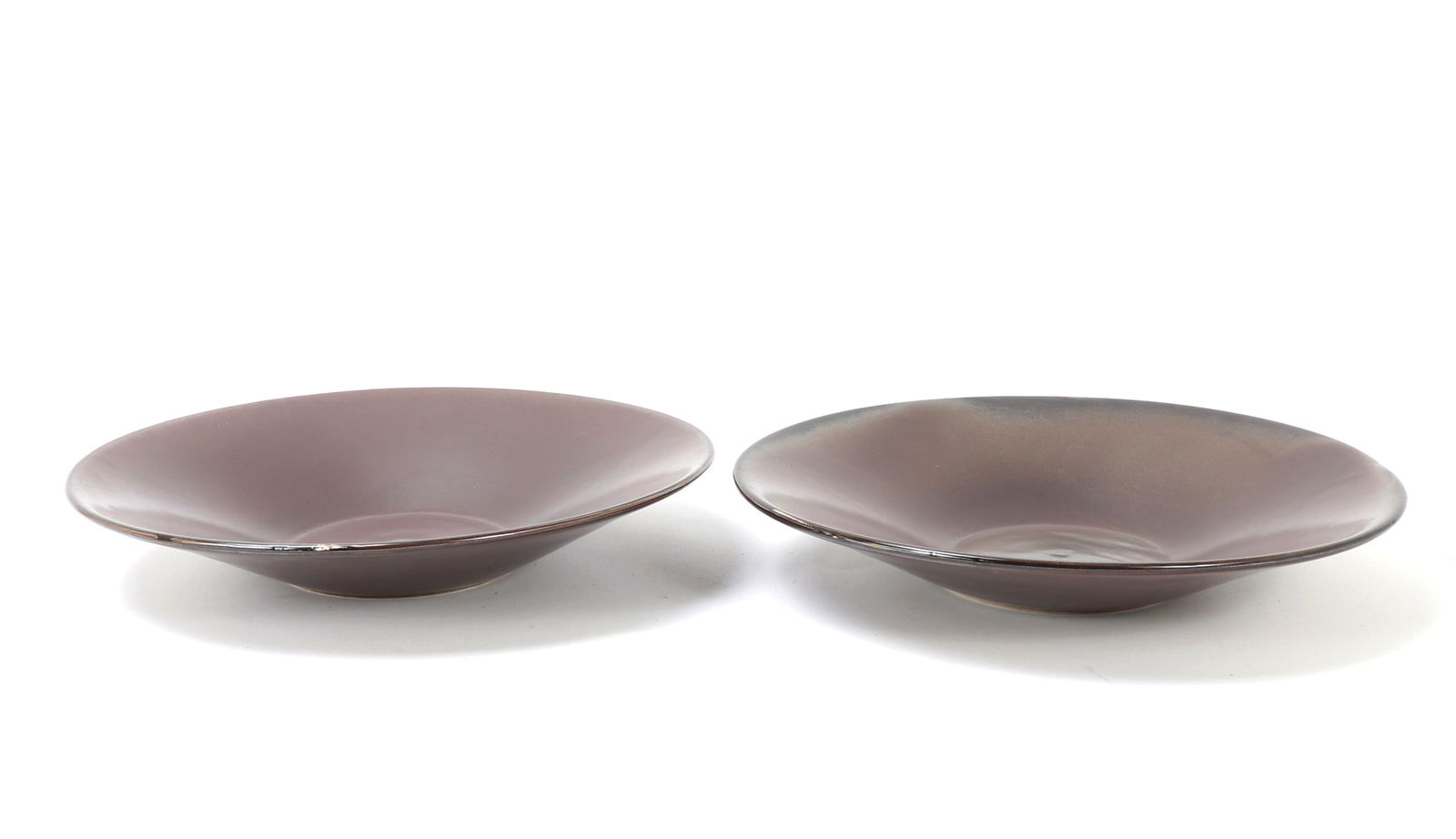 Pair of Brown Glazed Chinese Porcelain Plates: Nice pair of brown glazed porcelain shallow pasta plates with a concave center, slight pedestal foot and flared rim. Size 15 1/4" W