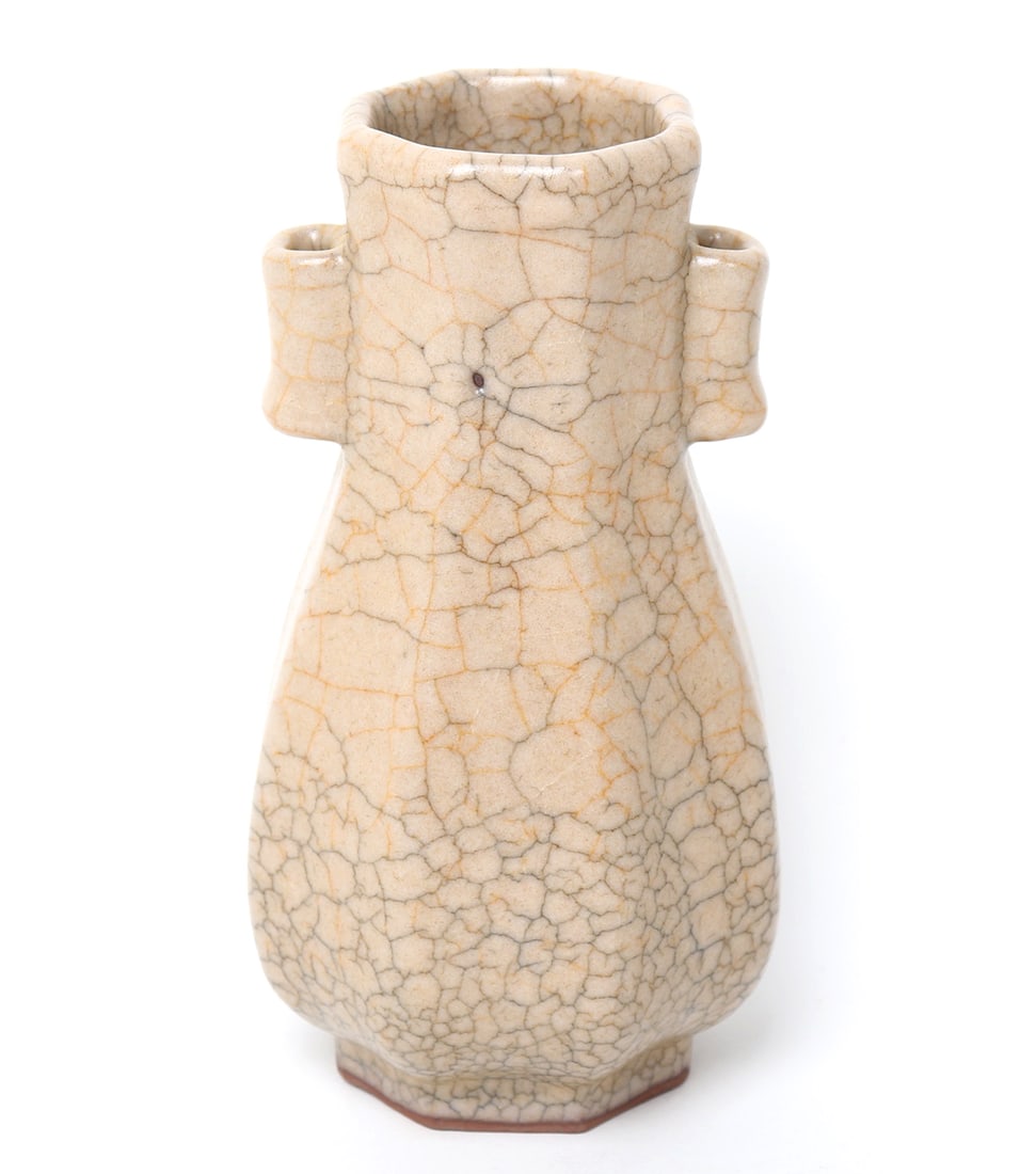 Lovely Chinese Cream Crackle Glazed Vase: Chinese Ge style octagonal crackle glazed small porcelain vase. Off-white almost khaki in color with two false handles to each side. Size 6 1/4" H x 3 1/2" W