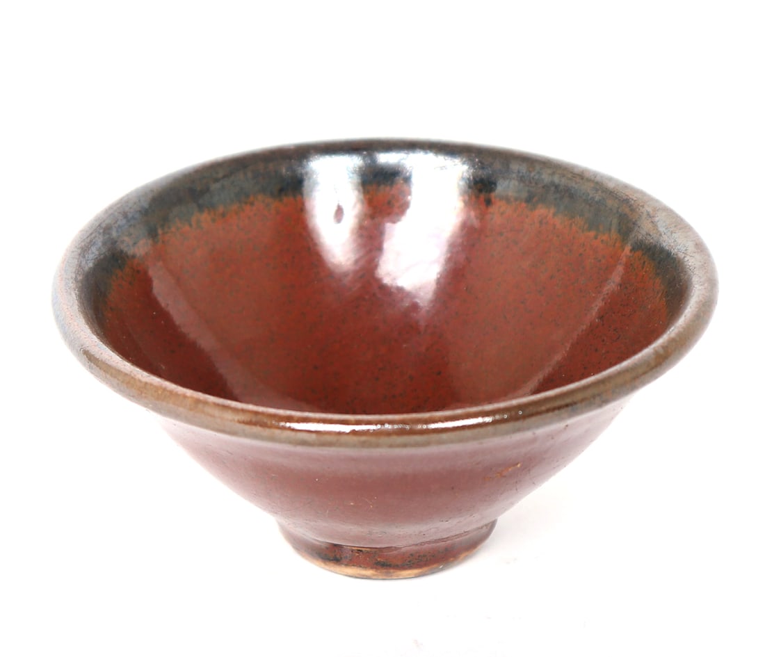 Chinese Brown and Black Glazed Bowl: Lovely Chinese brown and black glazed bowl, slightly raised foot to make for a sturdy base. Black glazed rim with brown interior and exterior glazed. Size 3 5/8" W x 1 3/4" H