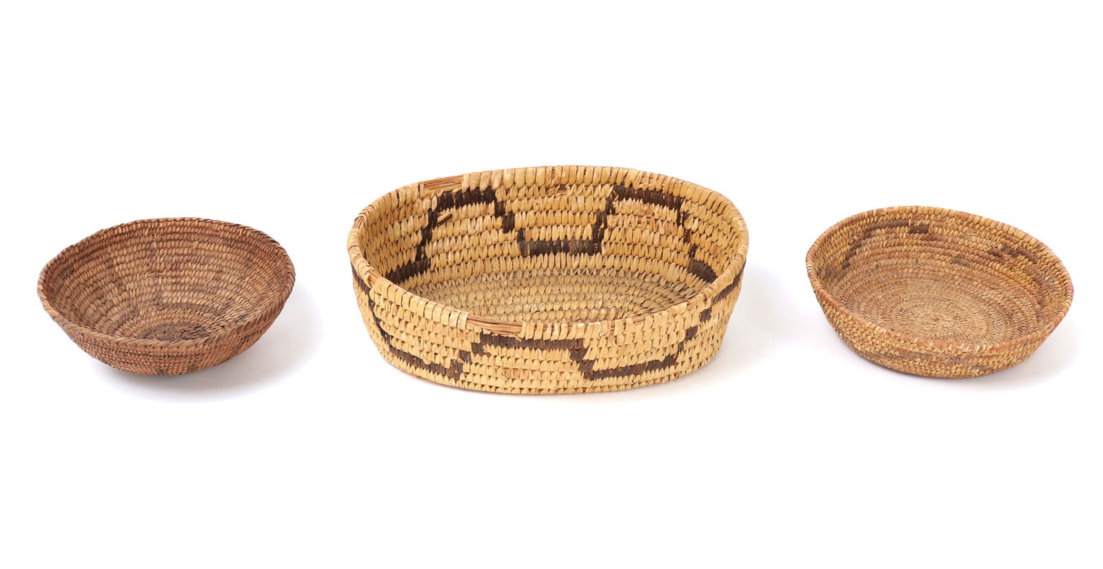 Three Mexican Baskets: Various group of three different Mexican made baskets for fruits, nuts or snacks. Two smaller side dish baskets with one oval shaped and decorated basket with a reinforced bamboo rim. Size 9" L x 7"