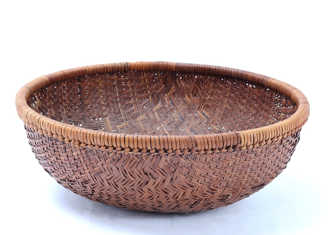 Vintage Hand Woven Basket: Old vintage hand woven basket with intricate interlaced basket and vertical laced rim. Size 11 1/2" W