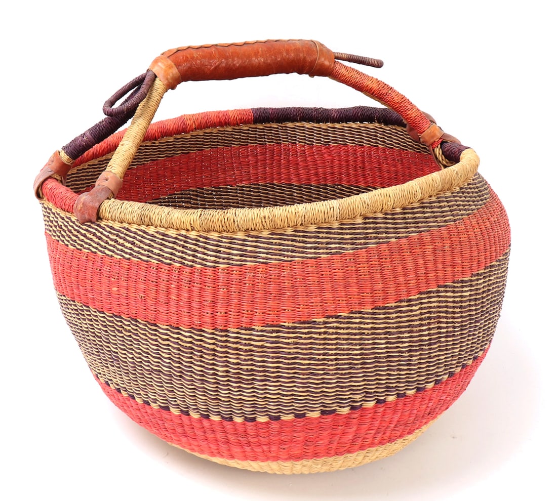 African Bolga Market Basket: Colorful and attractive African Bolga market basket. Intricately woven with dual attachments for the handle and loops at either end of the grip. Comprised of colors of natural fiber, red, black, and
